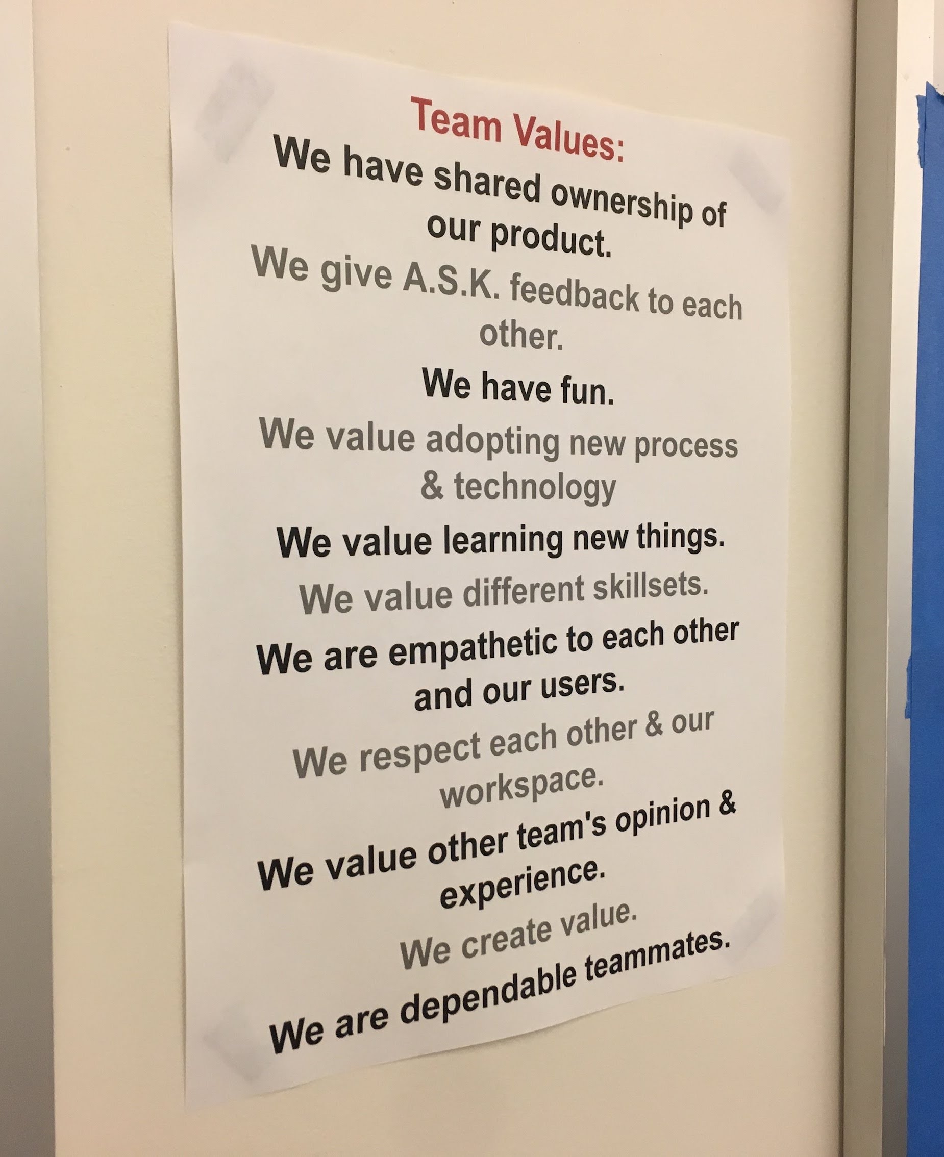 Summarized value statements up on the wall in team project area
